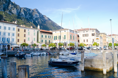 GARGNANO, LAKE GARDA, ITALY. 24th October 2017. Small boats lying moored up for the Autumn in the little harbour at the lakeside village of Gargagno, Lake Garda.のeditorial素材