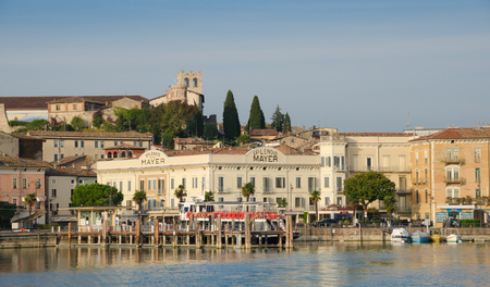 DESENZANO DEL GARDA, ITALY. 26th October 2017. The landing stage in Desenzano's harbour welcomes an increasing number of ferry tourists into the town each summer.のeditorial素材