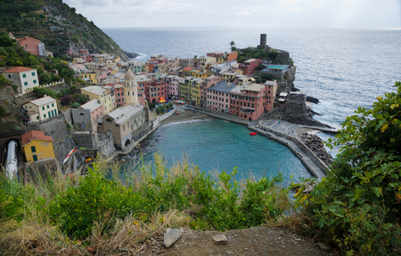 VERNAZZA, PROVINCE OF LA SPEZIA, ITALY. The pretty little town of Vernazza - one of the Cinque Terre - nestled on the coast below the Azure trail, is a perennial attraction for tourists.のeditorial素材