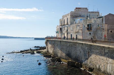 ORTIGIA, SIRACUSA, SICILY, ITALY. 30th December 2018. An evening view of the Forte Vigliena on the coast at Ortigia. A walk around the island of Ortigia is a common feature on the itineraries of visitors to Syracuse.のeditorial素材