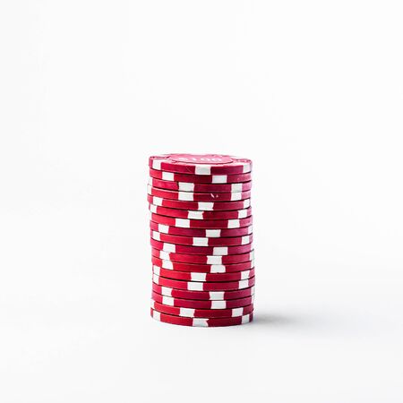 red poker chips on white background isolateの写真素材