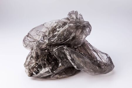 Black Plastic bag on white backgroundの写真素材