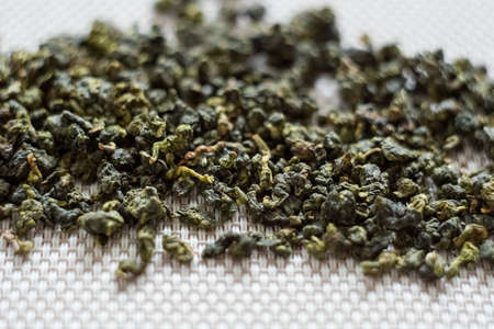 dry green oolong chinese tea leaves macro texture