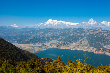 Famous tourist view of Phewa lake and Annapurna mountain  range from World Peace Pagoda in Pokhara, Nepalの写真素材