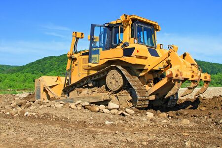 The bulldozer on a building site