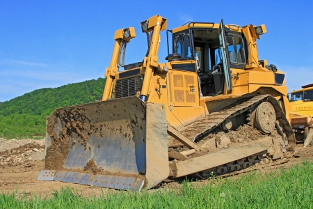 The bulldozer on a building siteの写真素材