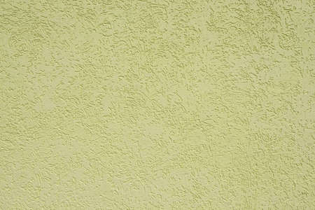 Fragment of a wall the covered plaster