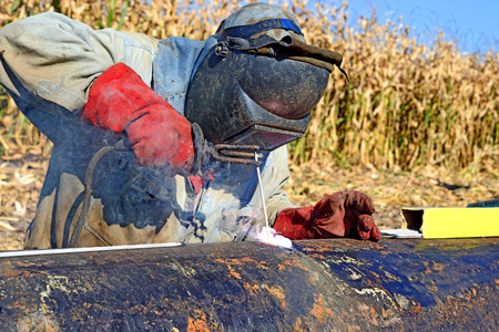 Welder on the pipeline repairs