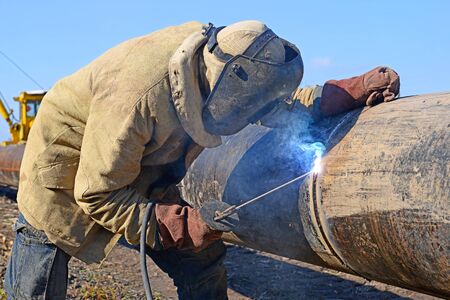 Welder on the pipeline repairs
