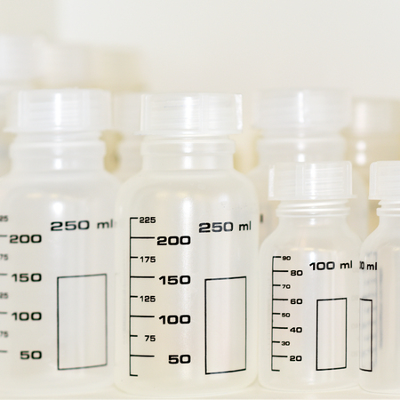 Graduated plastic bottles for use in research laboratories