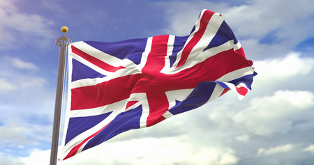 United Kingdom Flag Waving Wind On Sky Background. Wave And Fabric United Kingdom Flag.