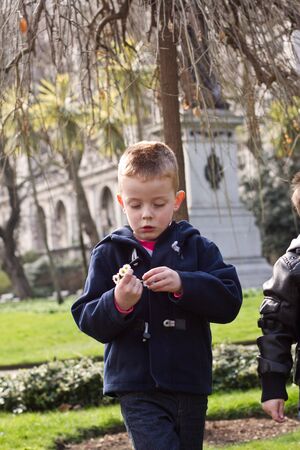 Young boy enjoying the sights in London Townの写真素材