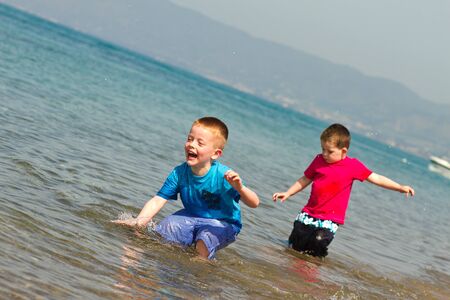 little boy having fun on summer holidayの写真素材