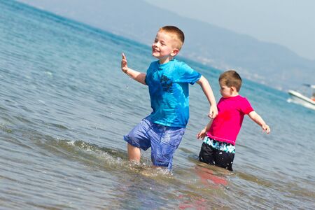 little boy having fun on summer holidayの写真素材