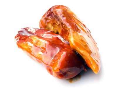 chicken breasts smothered in a tangy barbecue sauceの写真素材
