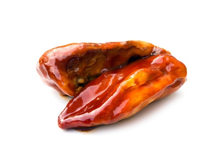 chicken breasts smothered in a tangy barbecue sauceの写真素材