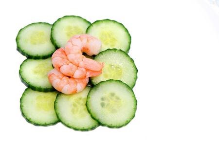 Prawns on a bed of cucumbersの写真素材
