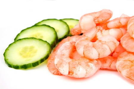 Prawns and cucumbers on whiteの写真素材