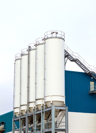concrete mixing factory on a grey cloudy dayの写真素材