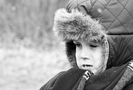 Upset little boy crying out loudの写真素材