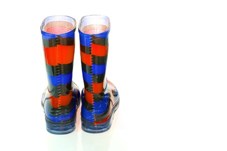 Multi Coloured wellington Boots on white with copy spaceの写真素材