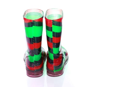 Multi Coloured wellington Boots on white with copy spaceの写真素材
