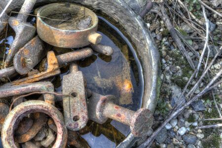 rusted old vintage scrap metal lying abandonedの写真素材