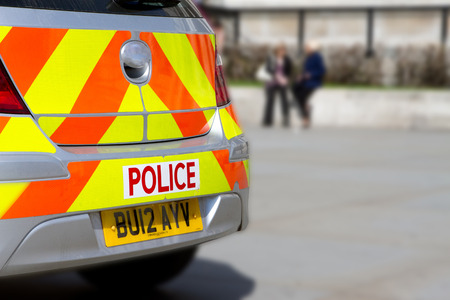 LONDON - APR 24th 2013 : Metropolitan Police Vehicle pulls up in the city centre to deal with an incidentのeditorial素材
