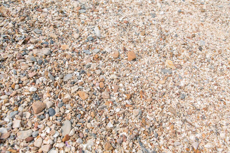 Different size and colour sea stones background and textureの写真素材