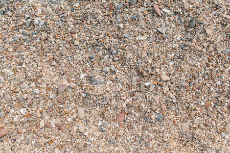 Different size and colour sea stones background and textureの写真素材