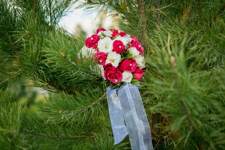 Beautiful wedding bouquet on the natural backgroundの写真素材