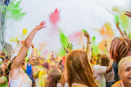 NOVOKUZNETSK, KEMEROVO REGION, RUSSIA-JULY 27, 2014 : Many young people on the festival of colors Holi in Russia, Novokuznetsk 27 July, 2014.のeditorial素材