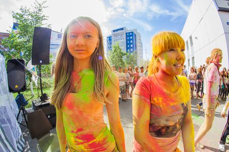 NOVOKUZNETSK, KEMEROVO REGION, RUSSIA-JULY 27, 2014 :: Two young girls on the festival of colors Holi in Russia, Novokuznetsk 27 July, 2014.のeditorial素材