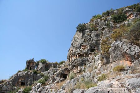 Ancient rock-cut tombs in Myra, Demre, Turkeyの写真素材