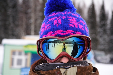 Sheregesh, Mountain Shoria, Kemerovo Region, Russia - 20 February, 2010 :: Girl snowboarder in a ski glasses with reflection.のeditorial素材