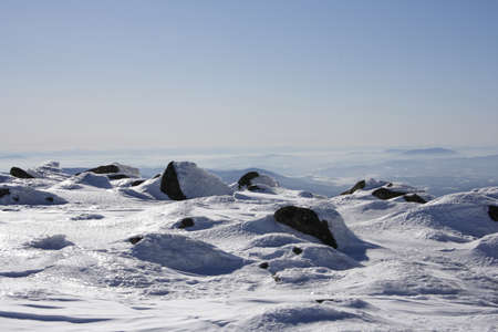 Beautiful winter landscape with snow, mountains and treesの写真素材
