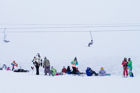 Sheregesh, Mountain Shoria, Kemerovo Region, Russia - December 18, 2016 :: Snowboarders and mountain...