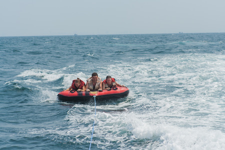 Chonburi, Thailand - March 16, 2015 :: Young people on water attractions during summer vacations