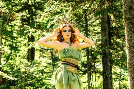 Portrait of a fairy princess in the summer forestの写真素材