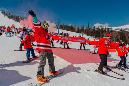 Sheregesh, Kemerovo region, Russia - April 22, 2017: Grelka Fest is a sports and entertainment activity for ski and snowboard riders in carnival costume. Young people in carnival costumes.のeditorial素材