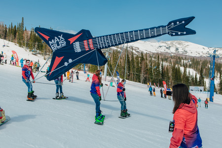 Sheregesh, Kemerovo region, Russia - April 22, 2017: Grelka Fest is a sports and entertainment activity for ski and snowboard riders in carnival costume. Young people in carnival costumes.のeditorial素材