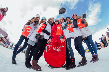 Sheregesh, Kemerovo region, Russia - April 22, 2017: Grelka Fest is a sports and entertainment activity for ski and snowboard riders in carnival costume. Young people in carnival costumes.のeditorial素材