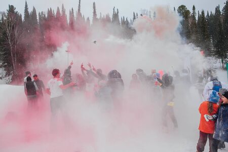 A group of a young people throwing colorful holi powder.のeditorial素材