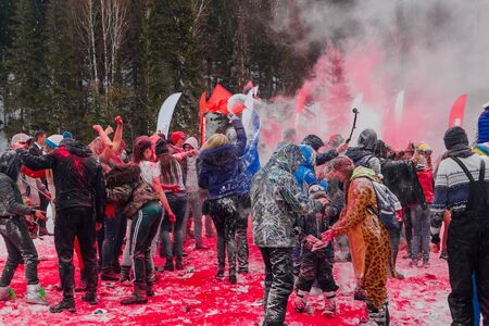A group of a young people throwing colorful holi powder.のeditorial素材