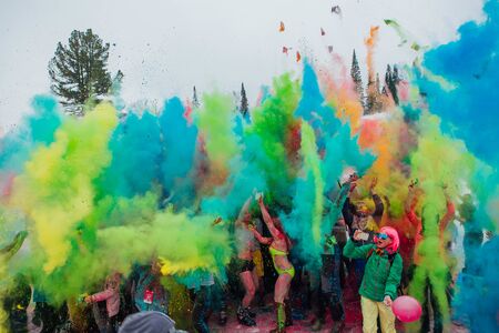 A group of a young people throwing colorful holi powder.のeditorial素材