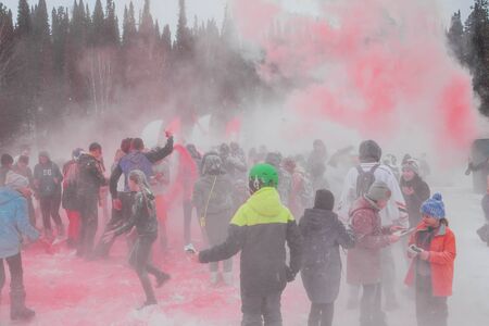 A group of a young people throwing colorful holi powder.のeditorial素材