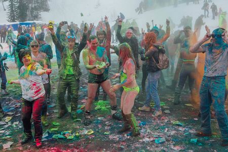 A group of a young people throwing colorful holi powder.のeditorial素材