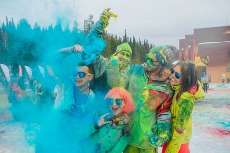 A group of a young people throwing colorful holi powder.のeditorial素材