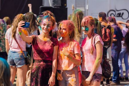 NOVOKUZNETSK, KEMEROVO REGION, RUSSIA-AUGUST 04, 2018 :: A group of a young people making selfie on the festival of colors Holi in Russia, Novokuznetsk 04 August, 2018.のeditorial素材