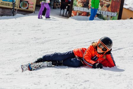 Sheregesh, Mountain Shoria, Kemerovo Region, Russia - April 6, 2018 : Little boy on mountain ski relaxing on the slopeのeditorial素材